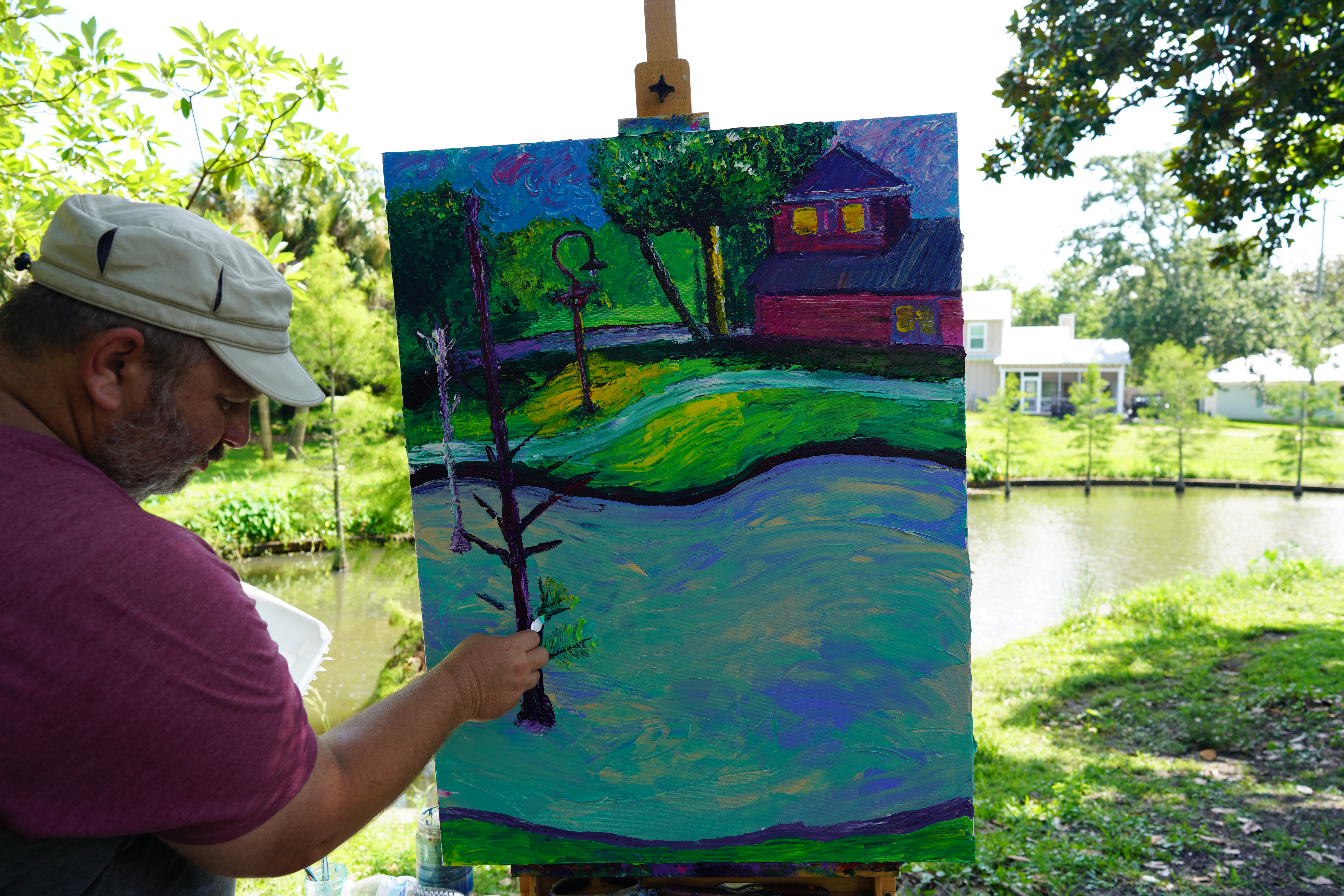 Artist paint the Bay St. Louis Duck Pond